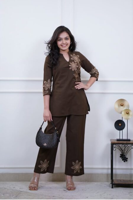 Woman wearing a brown embroidered kurti and pant co-ord set, perfect for daily wear, office wear, and ethnic occasions.
