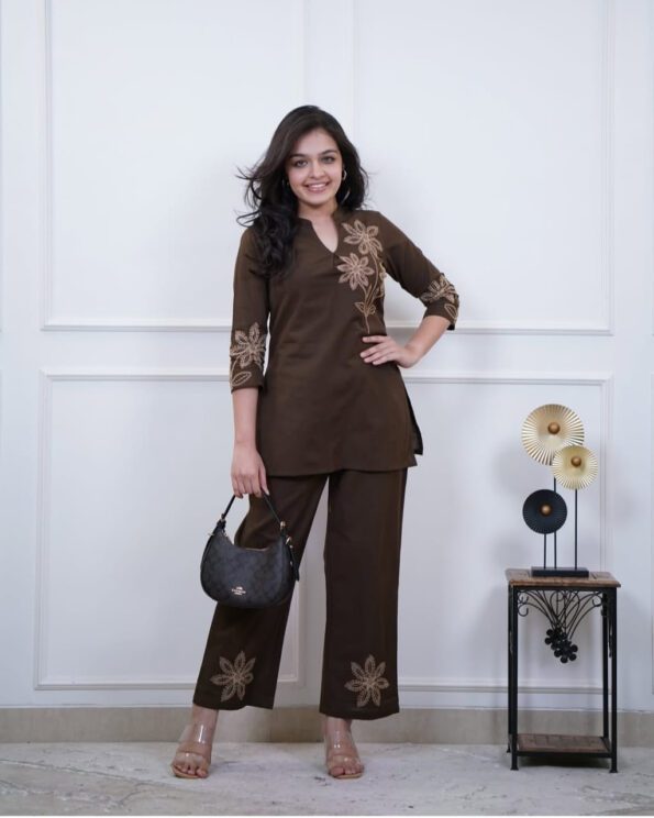Woman wearing a brown embroidered kurti and pant co-ord set, perfect for daily wear, office wear, and ethnic occasions.
