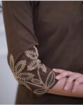 Woman wearing a brown embroidered kurti and pant co-ord set, perfect for daily wear, office wear, and ethnic occasions.