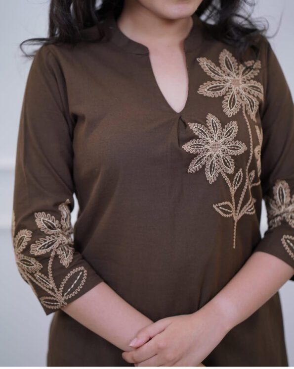 Woman wearing a brown embroidered kurti and pant co-ord set, perfect for daily wear, office wear, and ethnic occasions.