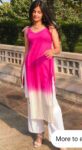 Woman wearing a sleeveless pink-to-white ombre kurti set with white palazzo pants, standing outdoors against a stone railing and lush green background, showcasing a stylish and modern ethnic summer outfit.