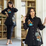 Woman wearing a black floral embroidered co-ord set with long shirt and straight pants – stylish casual and office wear outfit for women
