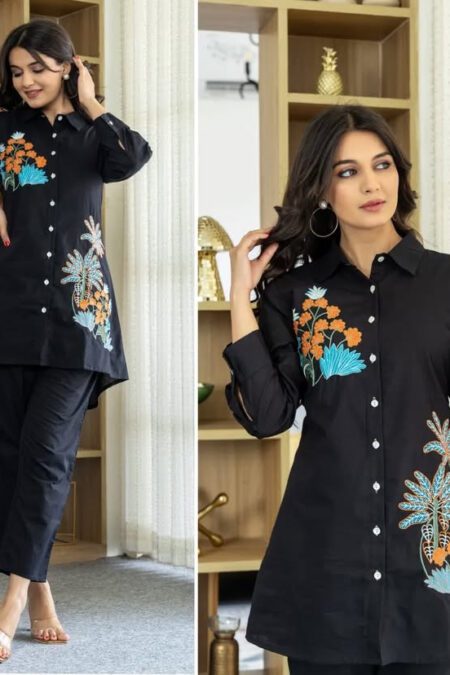 Woman wearing a black floral embroidered co-ord set with long shirt and straight pants – stylish casual and office wear outfit for women