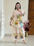 Women’s floral printed co-ord set with pastel kurta and wide-leg pants featuring vibrant nature-inspired prints”