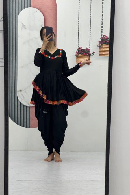 “Black Indo-Fusion co-ord set with peplum kurti and dhoti pants featuring colorful borders – festive ethnic wear for women”