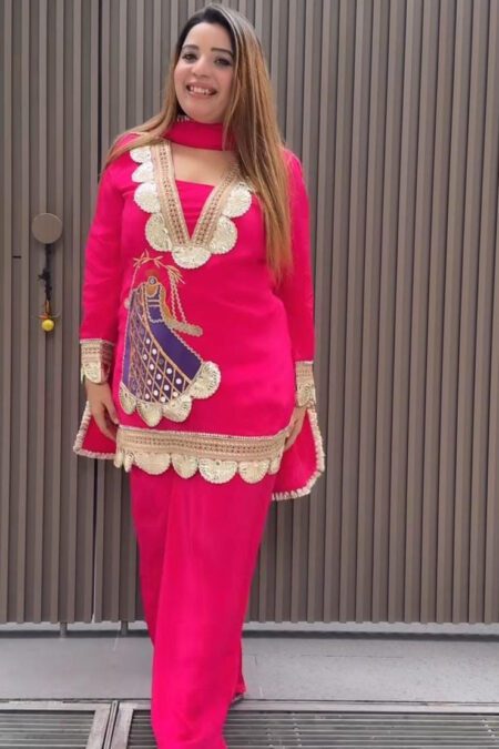 “Designer pink embroidered kurta set for women with golden lace detailing, matching pants, and dupatta – festive ethnic wear outfit”