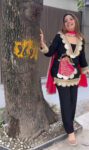 “Black embroidered kurta set for women with golden lace detailing, pink dupatta, and matching pants – festive party wear outfit”