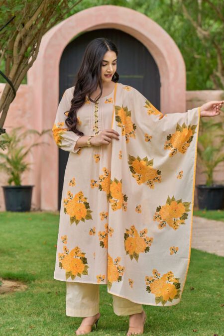 Woman wearing elegant cream floral printed kurta set with matching dupatta and pants – summer ethnic wear for women.